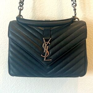Saint Laurent black and metal cross body handbag. Mint condition.